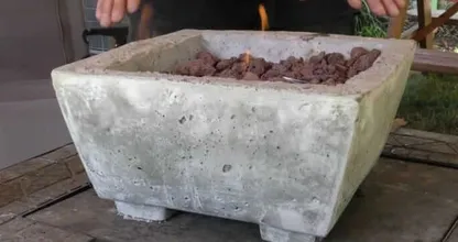 Wacht maar even met kopen van die dure vuurkorf voor in de tuin! Zo maak je 'm makkelijk zelf!