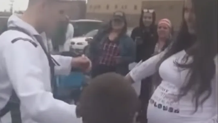 A Marine rushes home to greet his wife, but is surprised when he sees her