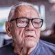 Worker learns his lesson when he finds out who the old man he has been pestering really is 