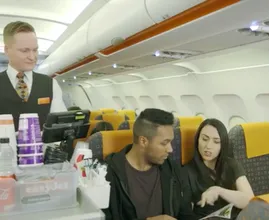 Ever wonder about those strange hand signals cabin crew use on planes? This is what they mean!