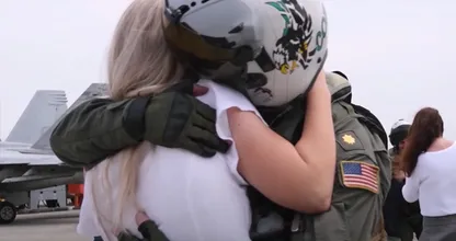 This fighter jet pilot was away for months, he freaks out when he sees his wife again
