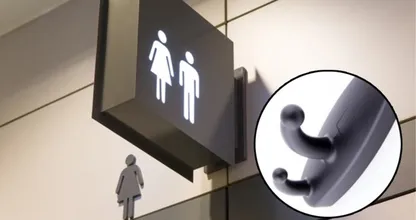 Du siehst diesen Kleiderhaken in einer öffentlichen Toilette? Wechsel die Kabine! Das ist kein Scherz.