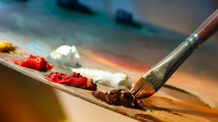 Woman removes paint from a painting and discovers her husband’s 50-year-old secret