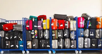 Moet je je handbagage tóch inchecken? Zo voorkom je het in de toekomst!