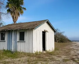 This Young Woman Lives in Old Shed on the Beach – But Wait Until you see Inside!