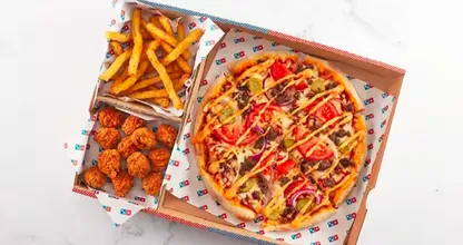 Smullen maar: Domino's lanceert deze heerlijke eenpersoons maaltijdbox