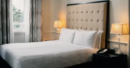 Dit is waarom hotels altijd wit beddengoed gebruiken