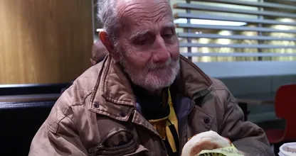 Homeless man reveals his true identity and shocks waitress who brings him food