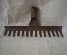 We want this too! This woman transformed this rusted rake into something fantastic!