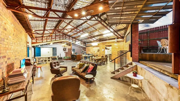This boring old warehouse is worth 1.2 million dollars! You'll get why when you see the inside