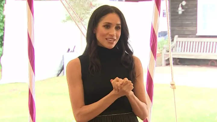 Meghan Markle launched her first cookbook and shared a sweet moment with Prince Harry