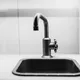 How to unclog a sink with dish soap and hot water