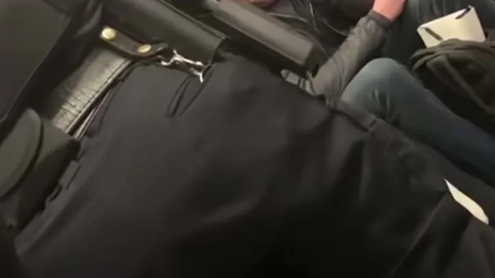 Rude passenger gets an equally rude awakening from the rest of the train 