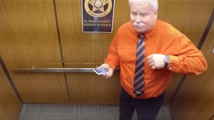 Oops! This police officer had no idea that a hidden camera was watching him.