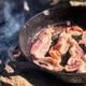 Why you should always rinse bacon strips in water before cooking