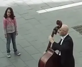 This street musician was ignored by everybody, but then a little girl changed everything