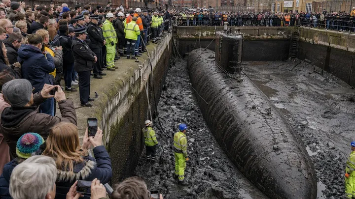Submarine Emerges in the Middle of the City –Then Maintenance Workers Take a Look Inside
