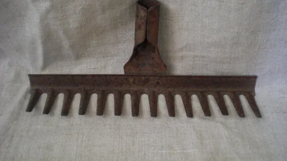 We want this too! This woman transformed this rusted rake into something fantastic!