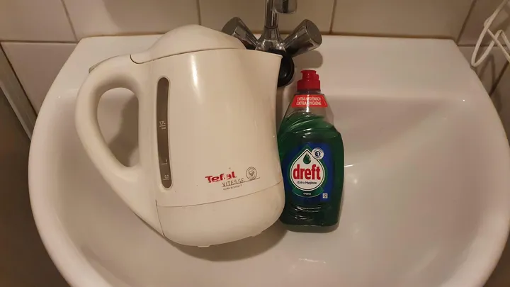 How to unclog a sink with dish soap and hot water