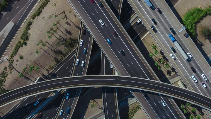Man runs along highway to stop runaway car