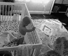 Couple Sets Up Hidden Camera In Baby's Room And Are Shocked By What They See