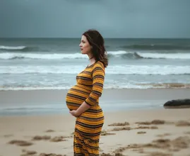 Un homme photographie sa femme enceinte mais voit quelque chose d'étonnant à l'arrière-plan