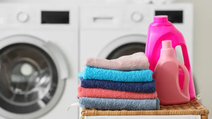 Towels that feel like cardboard? Why laundry pros cut detergent dose to get the softness back