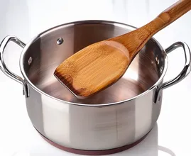 The simple wooden spoon trick that can stop your pan boiling over—but there’s a catch