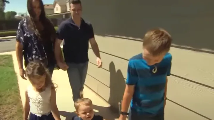 A Marine rushes home to greet his wife, but is surprised when he sees her