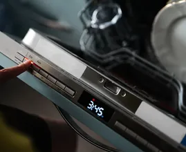 Why newer dishwashers open the door by themselves—and how to copy it on an older machine
