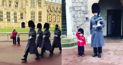 Deze trotse mini-paleiswacht haalt de échte Britse paleiswacht even uit hun rol... TE schattig!