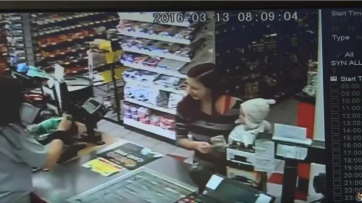 A mother is holding her baby when she has a seizure. What the store clerk does is truly amazing!