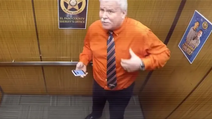 Oops! This police officer had no idea that a hidden camera was watching him.