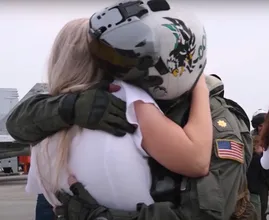 This fighter jet pilot was away for months, he freaks out when he sees his wife again