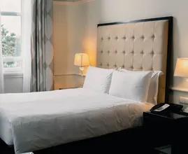 Dit is waarom hotels altijd wit beddengoed gebruiken