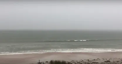 Look closely at the sea during this storm. It scared the living daylights out of this camera man! Very impressive!