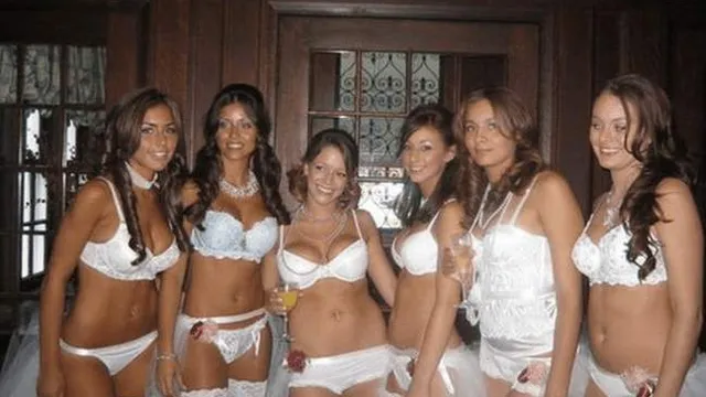 Notice anything strange about this old black and white photo? When we saw it, it gave us the creeps...